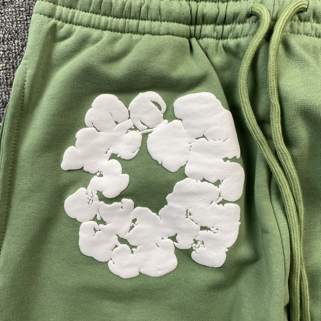 DENIM TEARS COTTON WREATH SWEATPANTS LIGHT GREEN