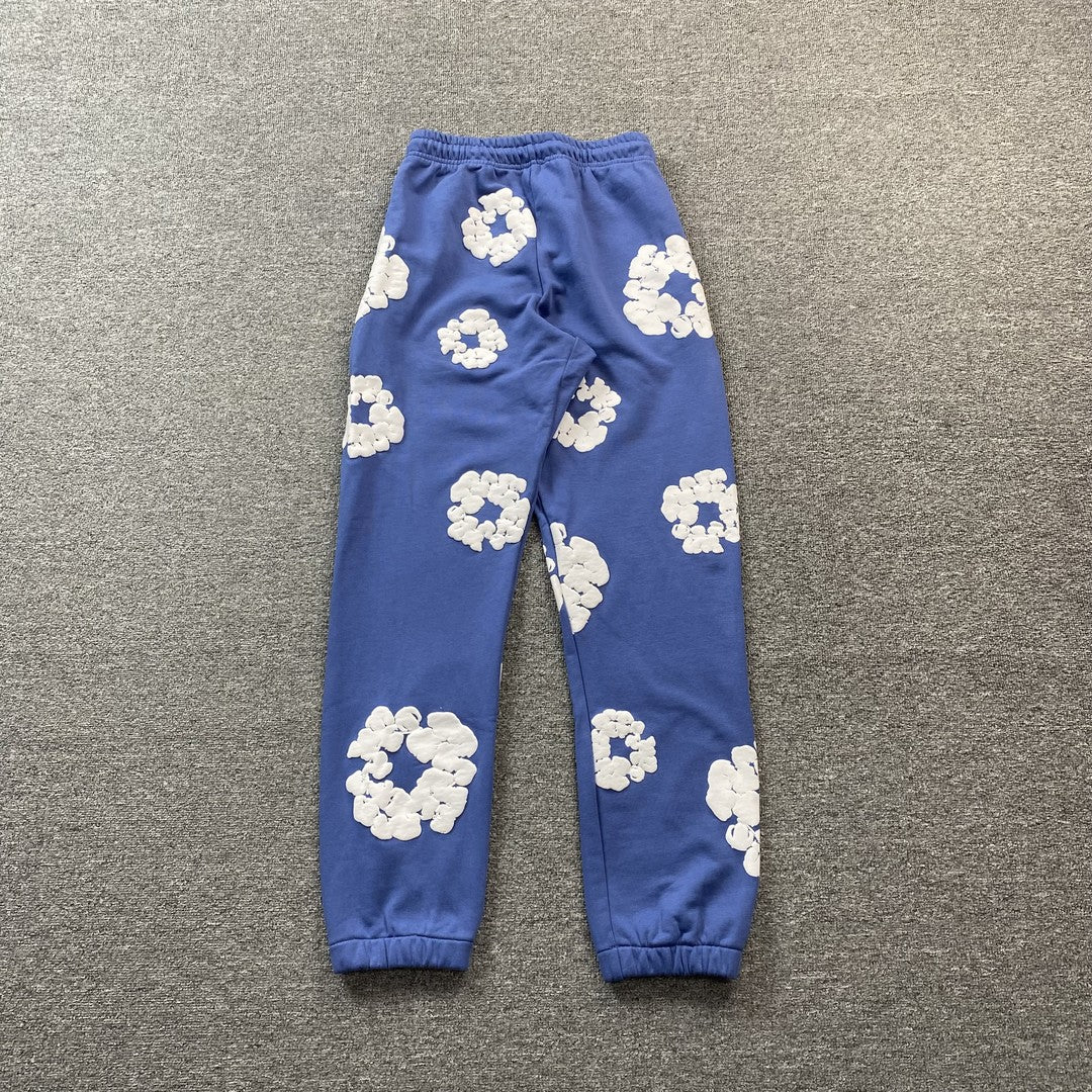 DENIM TEARS COTTON WREATH SWEATPANTS BLUE